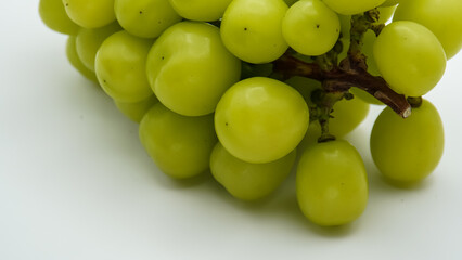 Beautiful a bunch of Shine Muscat green grape isolated on white background.