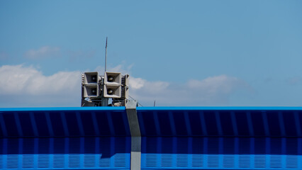 outdoor public address system consisting of five amplification megaphones