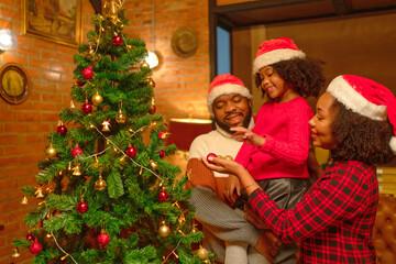 The family is celebrating Christmas, the day set aside to celebrate the birth of Jesus. who is the highest prophet of Christianity It is an annual holiday that Christians attach great importance to.