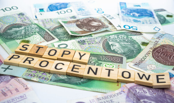 Polish word "stopy procentowe" interest rates concept Polish zloty banknote background currency