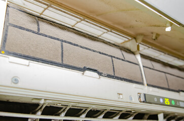 Dirty air conditioner filter need cleaning. Air conditioner service  repair and clean equipment.