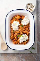 Pasta with tomato sauce, eggplant and cheese