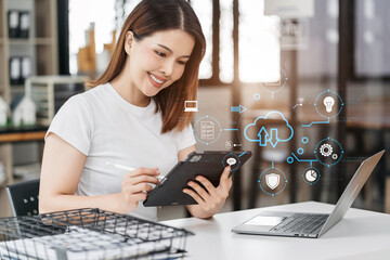Woman is using a smartphone and tablet to access the cloud computing system , Storage and data...
