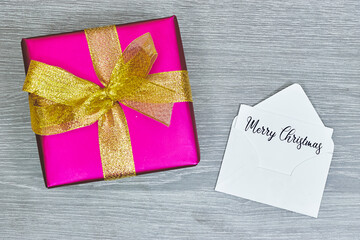 white envelope and gift box on wooden table Show your appreciation for holiday