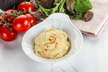Creamy hummus in the bowl
