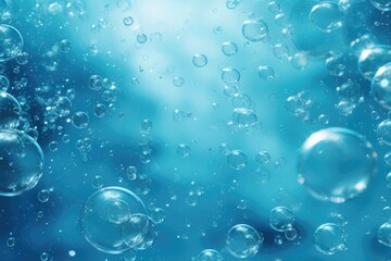 Bubbles in water on blue background