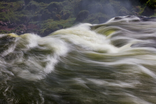 Waterfall details with waves at Iguazu Waterfalls, Argentina
