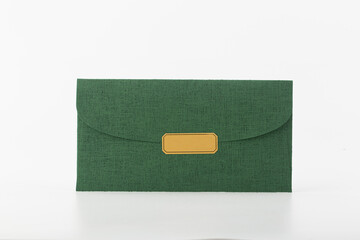 green envelope with tank you sticker on it