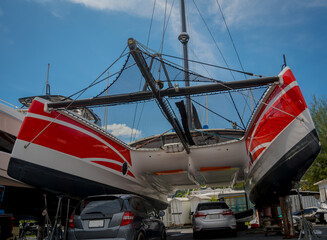 Motor yacht moored for repairs and service in dry dock