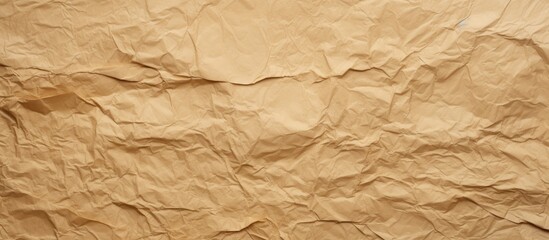 Fototapeta premium Brown paper texture crumpled horizontally.