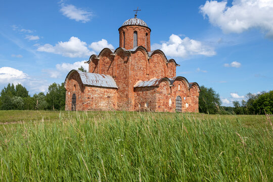 The ancient church of the Transfiguration of the Savior on Kovalevo in the vicinity of Veliky Novgorod on a sunny July day. Russia