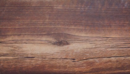 Obraz premium A texture of brown wood wallpaper.