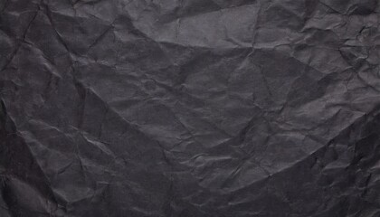 A black crumpled paper background.