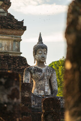 Stone buddha at Wat Mahathat in Sukhothai Historical Park.