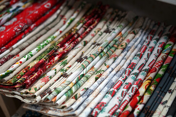 Composite fabrics of various motifs, which are carefully aligned with each other.