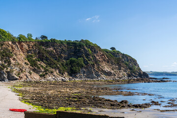 View of the cliffs and beach of Charlestown, Cornwall, England, UK