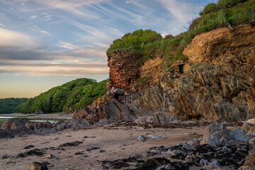 Wonwell Beach and low tide on the River Erme, with an old Lime kiln in the background, near Mothecombe, Devon, England, UK