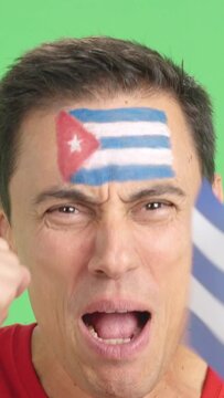 Close up of a man supporting cuban team