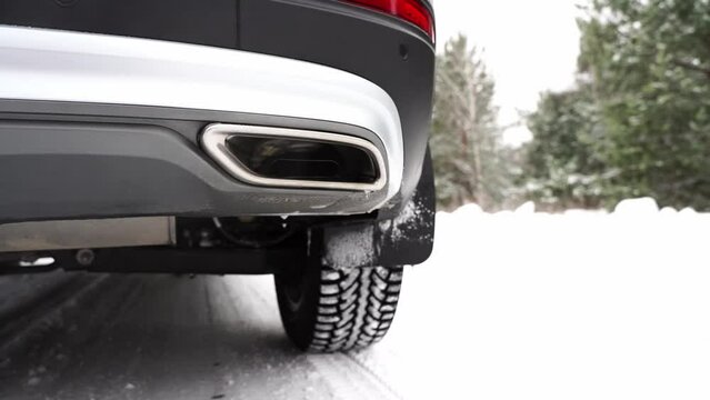 the exhaust pipe of a wound-up car and exhaust gases in nature