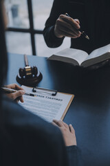 Business and lawyers discussing contract papers with brass scale on desk in office. Law, legal services, advice, justice and law concept picture with film grain effect - obrazy, fototapety, plakaty