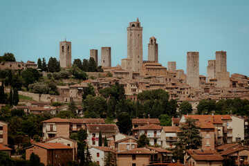 Towers of San Gimignano, Tuscany, on a clear blue sky - obrazy, fototapety, plakaty