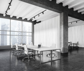 Stylish workspace interior with table and armchairs, panoramic window