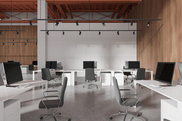Modern office workplace interior with pc desktop and chairs in row