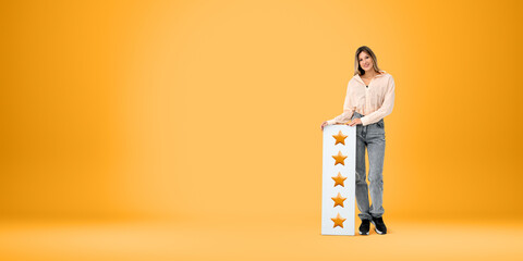 Smiling woman holding five stars sign - Powered by Adobe