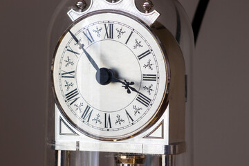  Small standing clock showing countdown time - obrazy, fototapety, plakaty
