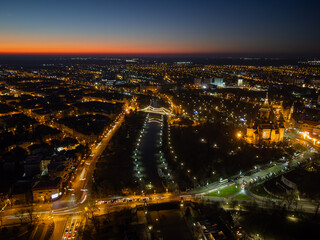 Fototapeta na wymiar Aerial view of Timisoara, Romania with the city lights and Christmas lights at blue hour