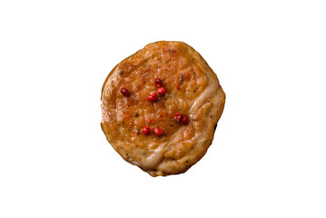 Grilled meatballs with spices and herbs or crepinette on a black plate