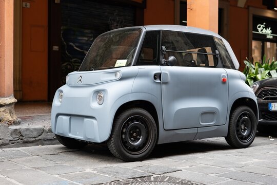 Ugly Citroen Ami One electric mini car parked on a street of Bologna