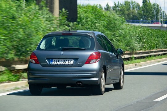 Peugeot 207 French car driving on a highway