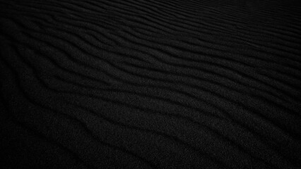 Black Sand dune. Black Sand beach macro photography. Background, texture, wave pattern of oceanic sand on the beach, black. Texture of beach sand. Black beach. - obrazy, fototapety, plakaty