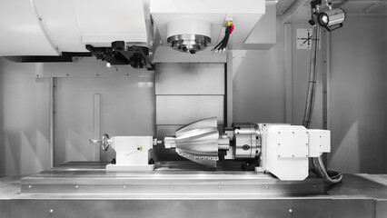 Metal machine tools industry. CNC turning machine high-speed cutting is operation.