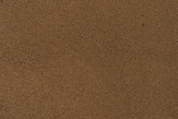 Texture of wet sand on a beach top view - obrazy, fototapety, plakaty