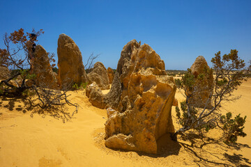 Pinnacles Desert in Western Australia, Nambung National Park, yellow desert, rocks on sand