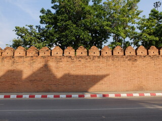 Ancient wall of Tha Phae Gate at Chiang Mai province, Thailand.
