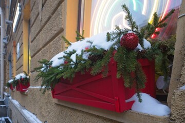  St. Petersburg, Russia, December 16, 2023. New Year's decorations in flower boxes of a residential building.                          