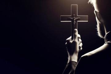 The priest holds the cross close up on black background. ai generative - obrazy, fototapety, plakaty