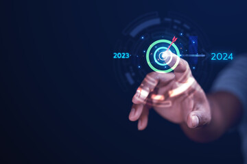 New business ideas start up Business planning, year goals from 2023 to 2024. Businessman showing success, achieving corporate business investment goals.
