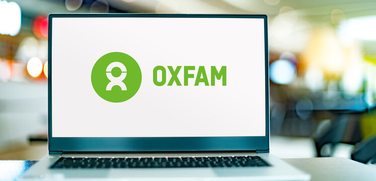 Laptop displaying logo of Oxfam