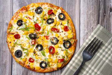 Veg Pizza serving. Italian dish