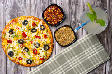 Veg Pizza serving. Italian dish