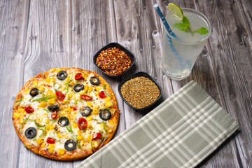 Veg Pizza serving. Italian dish