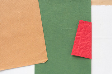 textured paper and red tab with wrinkles on white 