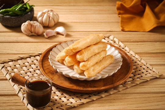 Pempek Palembang, traditional food from South Sumatra, Indonesia. This fish-based food is very popular. Served with cuko sauce