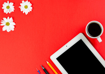 Office supplies with tablet, phone and cup of coffee, office stationery