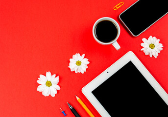 Office supplies with tablet, phone and cup of coffee, office stationery