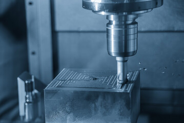 The CNC milling machine rough cutting the injection mold parts by indexable tools.
